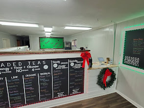 Inside Dandridge Lakeside Nutrition, showing the chalkboard menus and front counter